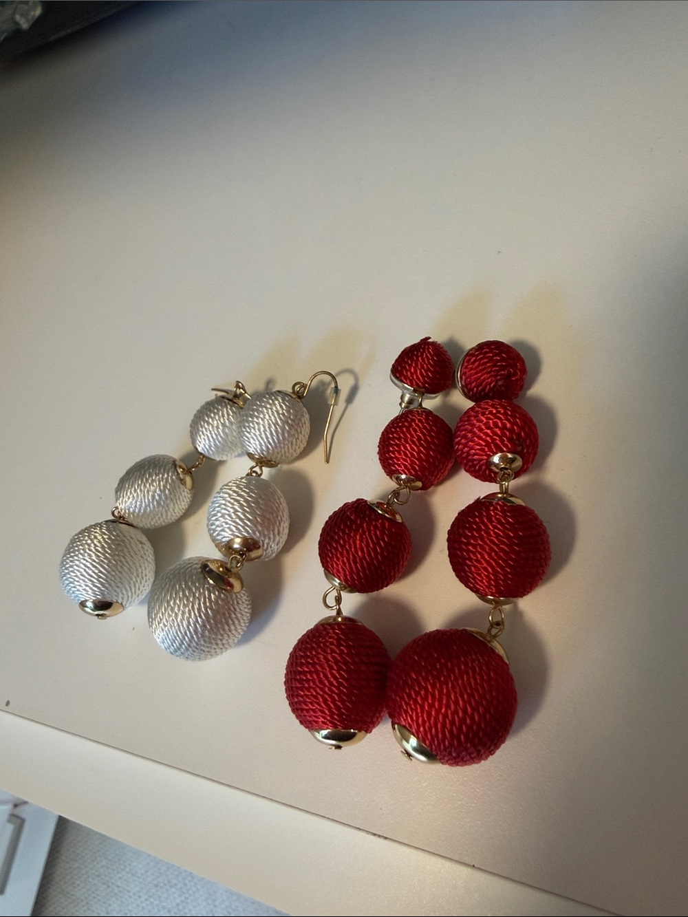 Two pairs of Triple-Ball Drop Earrings in Red and White